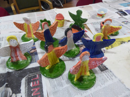 colourful angels made by the residents of Wessex House care setting 